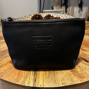 Coach leather travel bag.